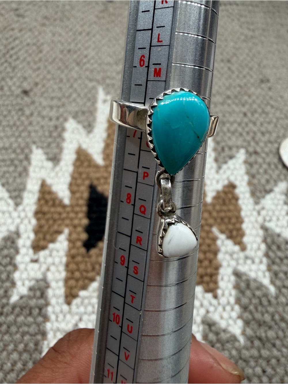 Kingman turquoise ring with white buffalo small stone